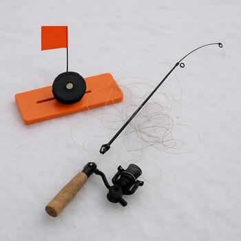 Tip-up and rod line tangled together on packed snow